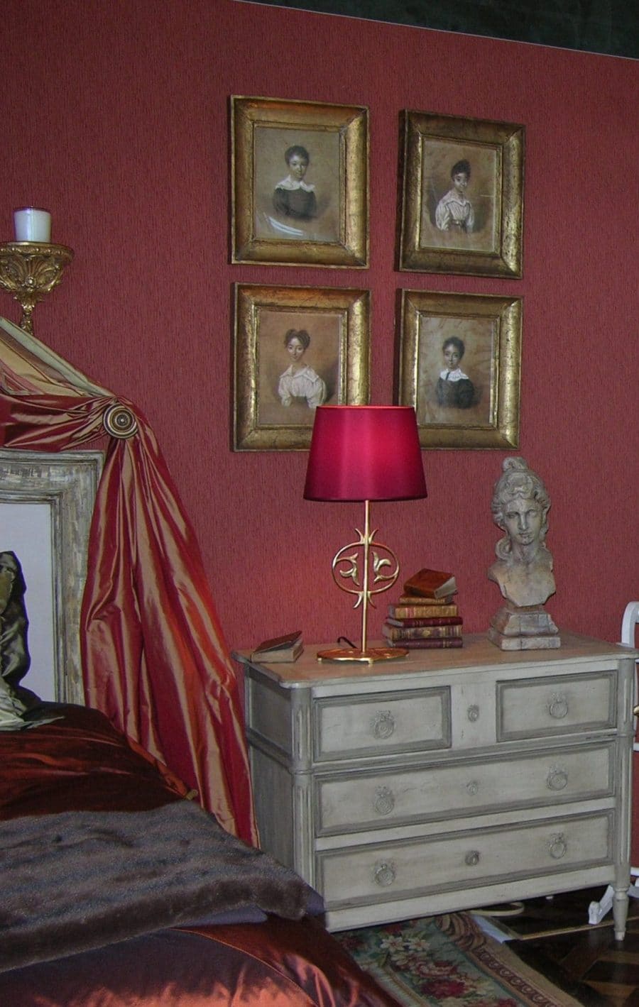 bedroom wall upholstery in red fabric