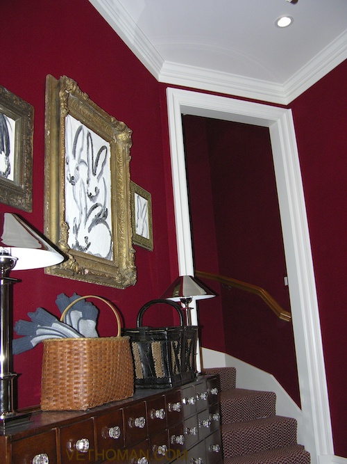 red wall upholstery fabric in passage hallway