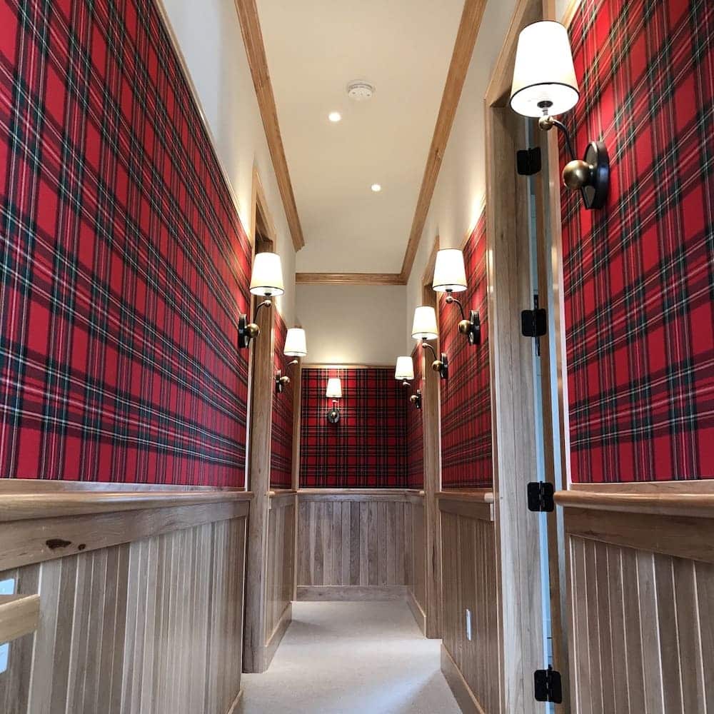 walls upholstered in red fabric in hallways