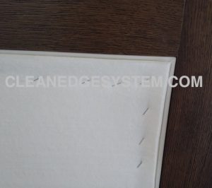 Add the padding. Staple on the panel, not the track