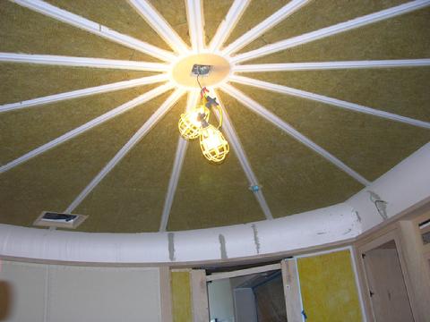 acoustical layer of fiberboard on ceiling in home cinema